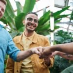 photo of people doing fist bump